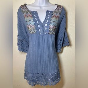 Lovely woman’s loose fitting blouse